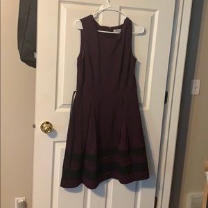 Plum sleeveless swing dress with belt